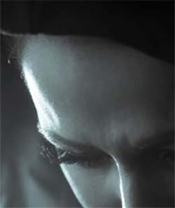 Woman's Face in Shadows