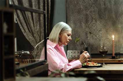 Woman Eating Dinner Alone