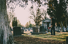 Husband Visiting Wife's Grave