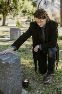 Man at Headstone