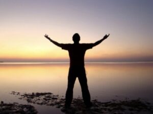 Man on Beach at Sunset