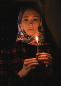 Woman Holding Candle