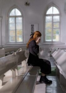 Woman Crying In Church