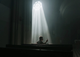 Light Shining on Person In Church