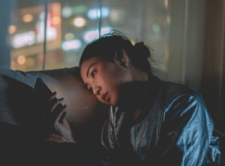 Woman In Dark with Phone