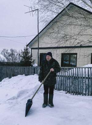 Man Shoveling Snow