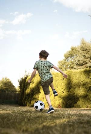 Kid Playing Soccer