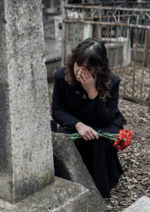 Woman Visiting Grave