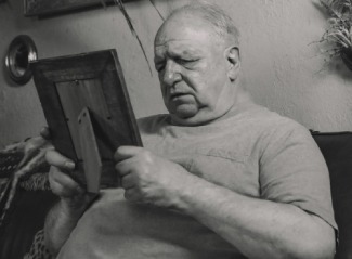 Man with Picture Frame