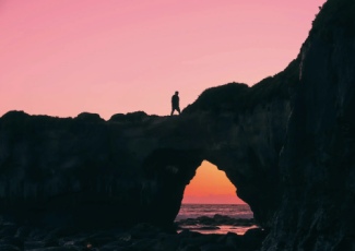 Figure on Bridge at Sunset
