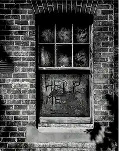 Dirty window with Help written in the dirt