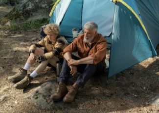 Man and Boy In Front of Tent
