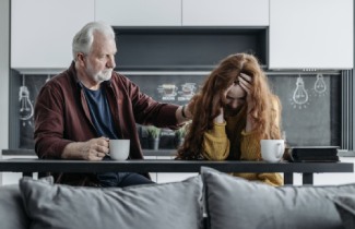 Man Comforting Woman